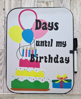 whiteboard with birthday cake and balloons