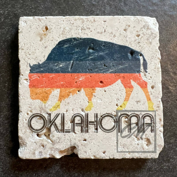 Four coaster set – Oklahoma Sunset Buffalo on travertine tile